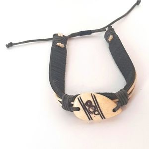 Brown and cream carved bone adjustable bracelet